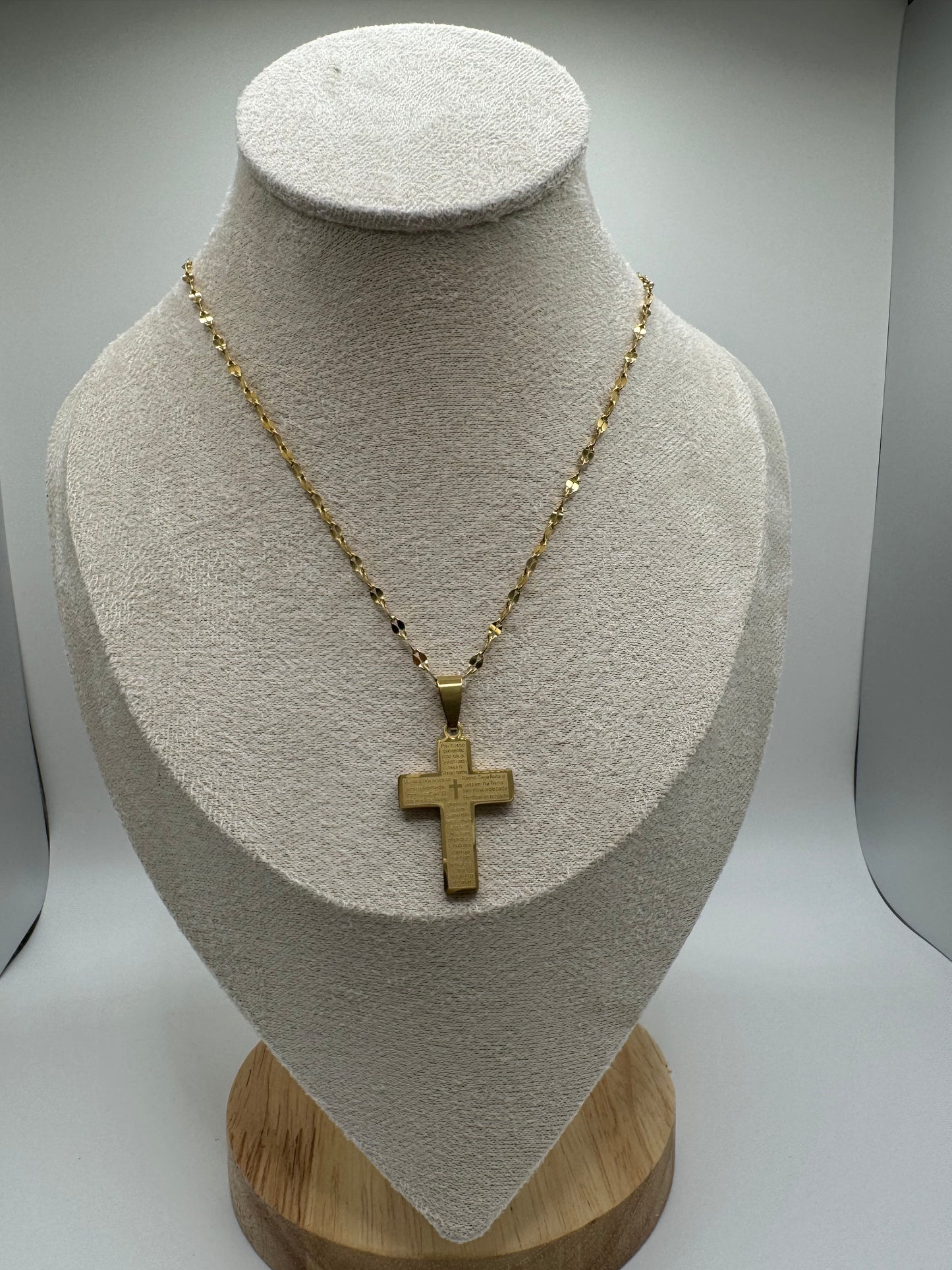 Gold cross pendant